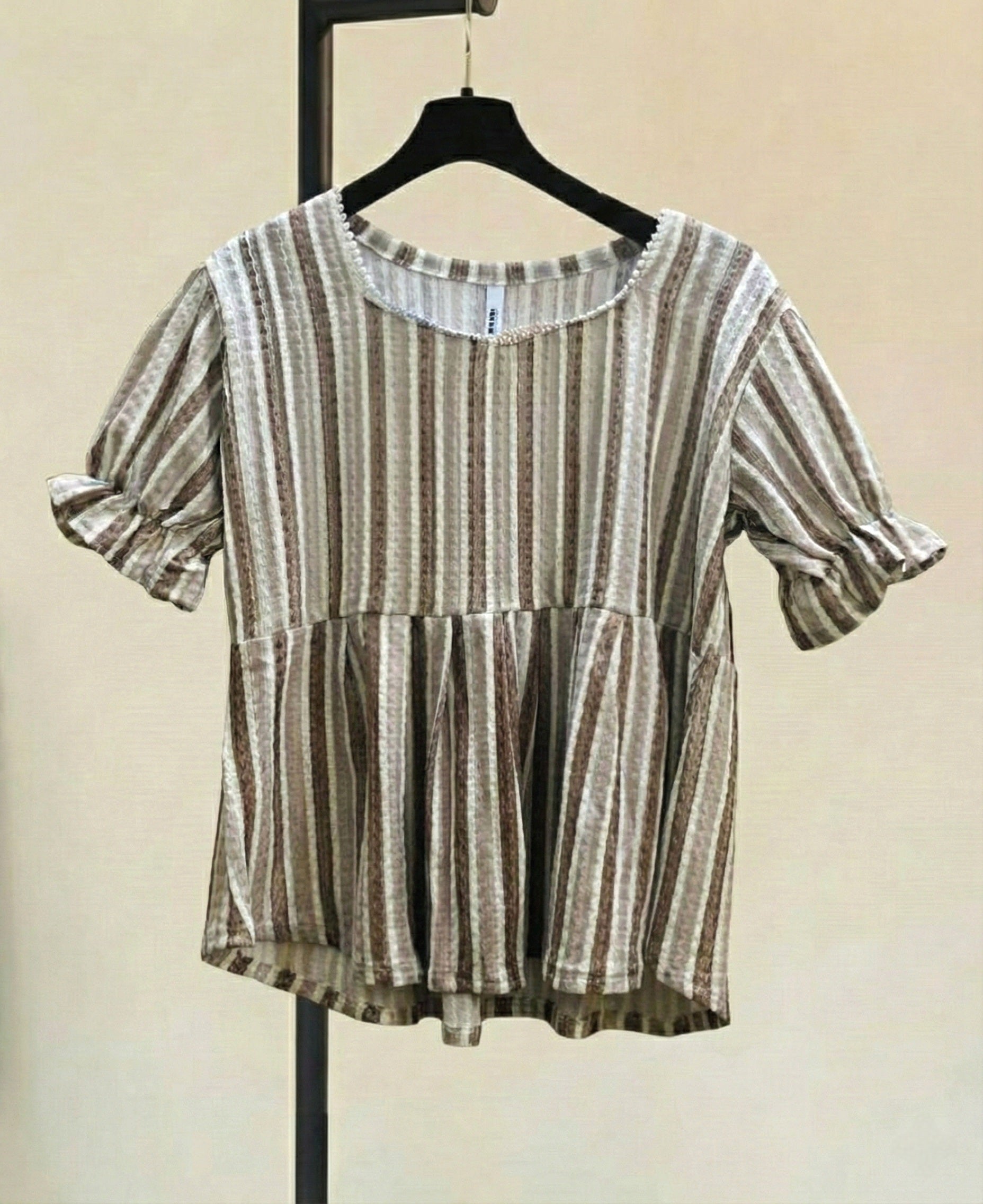 Add a touch of earthy elegance to your wardrobe with this stylish striped top in warm neutral tones. Designed with a flattering fit and ruffle sleeves, the subtle pearl detailing at the neckline brings a classy finish. Perfect for daily wear, coffee dates, or casual Fridays!